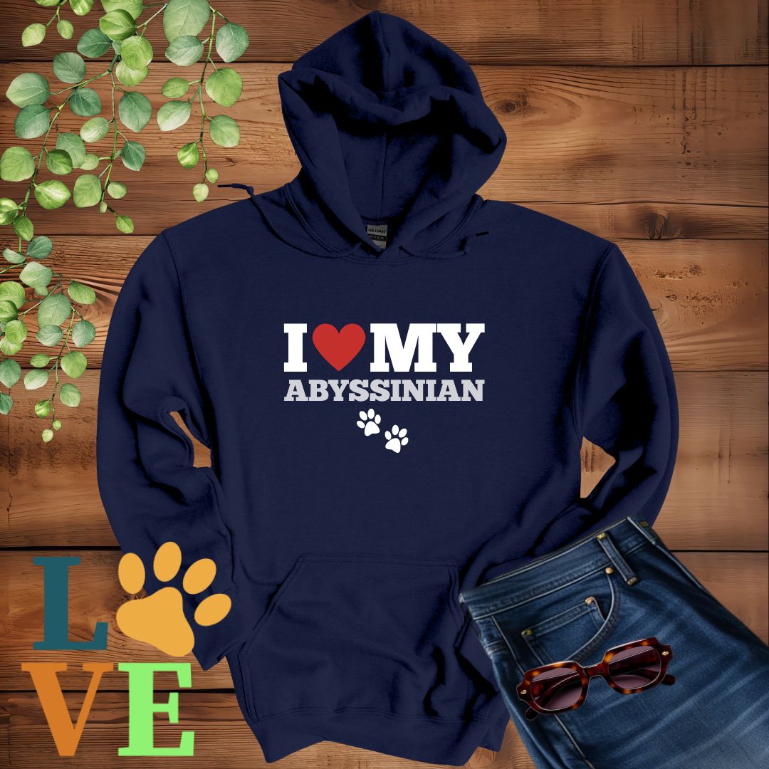 Navy blue hoodie with 'I ❤️ MY ABYSSINIAN' text on a wooden background