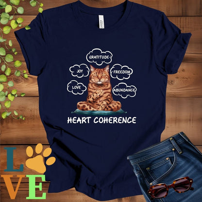 Navy Blue t-shirt with a meditating Bengal cat, surrounded by floating emotion bubbles labelled love, joy, gratitude, freedom, abundance, and 'Heart Coherence' slogan.