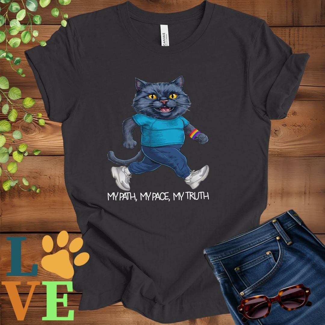 Dark grey heather t-shirt featuring an anthropomorphic black cat in exercise wear walking confidently with the slogan, "My path, my pace, my truth."

