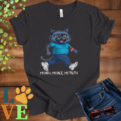 Dark grey heather t-shirt featuring an anthropomorphic black cat in exercise wear walking confidently with the slogan, "My path, my pace, my truth."

