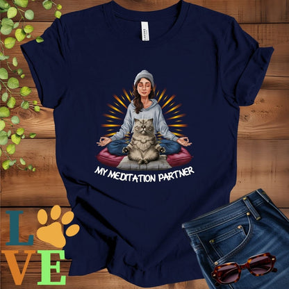 Navy blue t-shirt featuring a woman meditating with her Exotic Shorthair cat and the slogan "My meditation partner".
