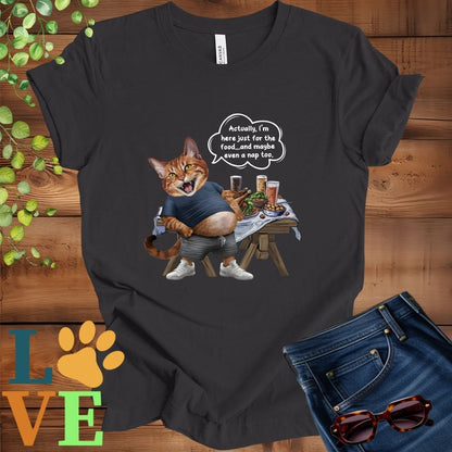 Dark grey heather t-shirt with an anthropomorphic Abyssinian cat,  standing in front of a table with food and drinks, showing its pot belly and humorous speech bubble message.