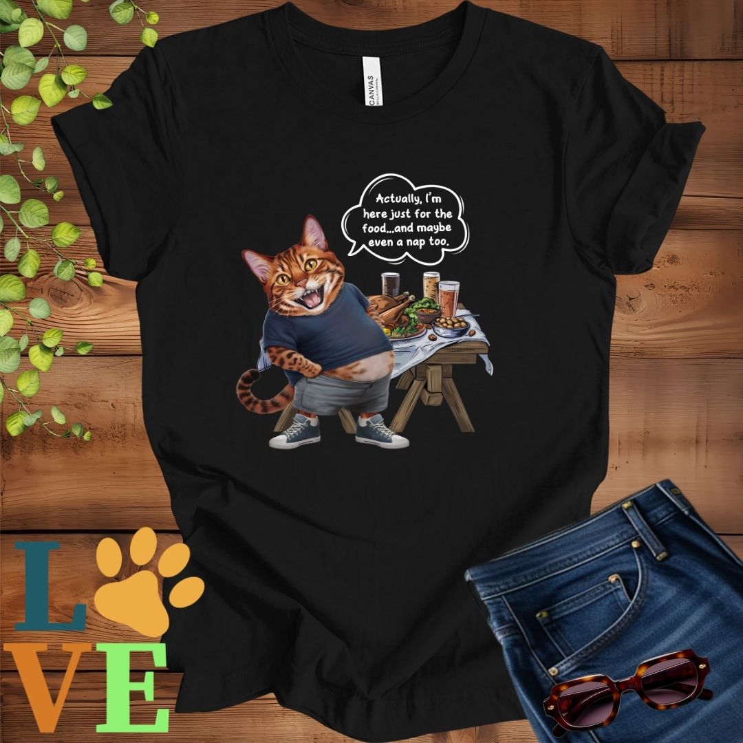 Black t-shirt with an anthropomorphic Bengal cat, standing in front of a table with food and drinks, showing its pot belly and humorous speech bubble message.