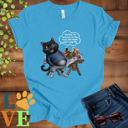 Bright aqua blue t-shirt with an anthropomorphic black cat, standing in front of a table with food and drinks, showing its pot belly and humorous speech bubble message.