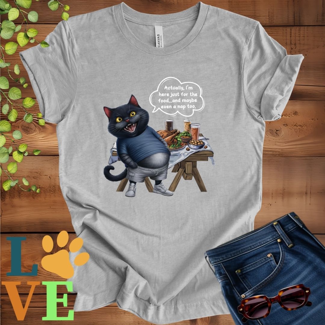 Light grey heather (athletic heather) t-shirt with an anthropomorphic black cat, standing in front of a table with food and drinks, showing its pot belly and humorous speech bubble message.