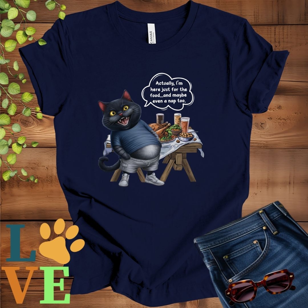 Navy Blue t-shirt with an anthropomorphic black cat, standing in front of a table with food and drinks, showing its pot belly and humorous speech bubble message.
