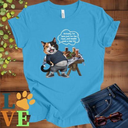 Bright aqua blue t-shirt with an anthropomorphic calico cat, standing in front of a table with food and drinks, showing its pot belly and humorous speech bubble message.
