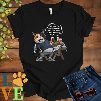 Black t-shirt with an anthropomorphic calico cat, standing in front of a table with food and drinks, showing its pot belly and humorous speech bubble message.