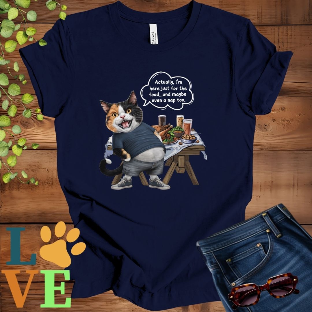 Navy Blue t-shirt with an anthropomorphic calico cat, standing in front of a table with food and drinks, showing its pot belly and humorous speech bubble message.