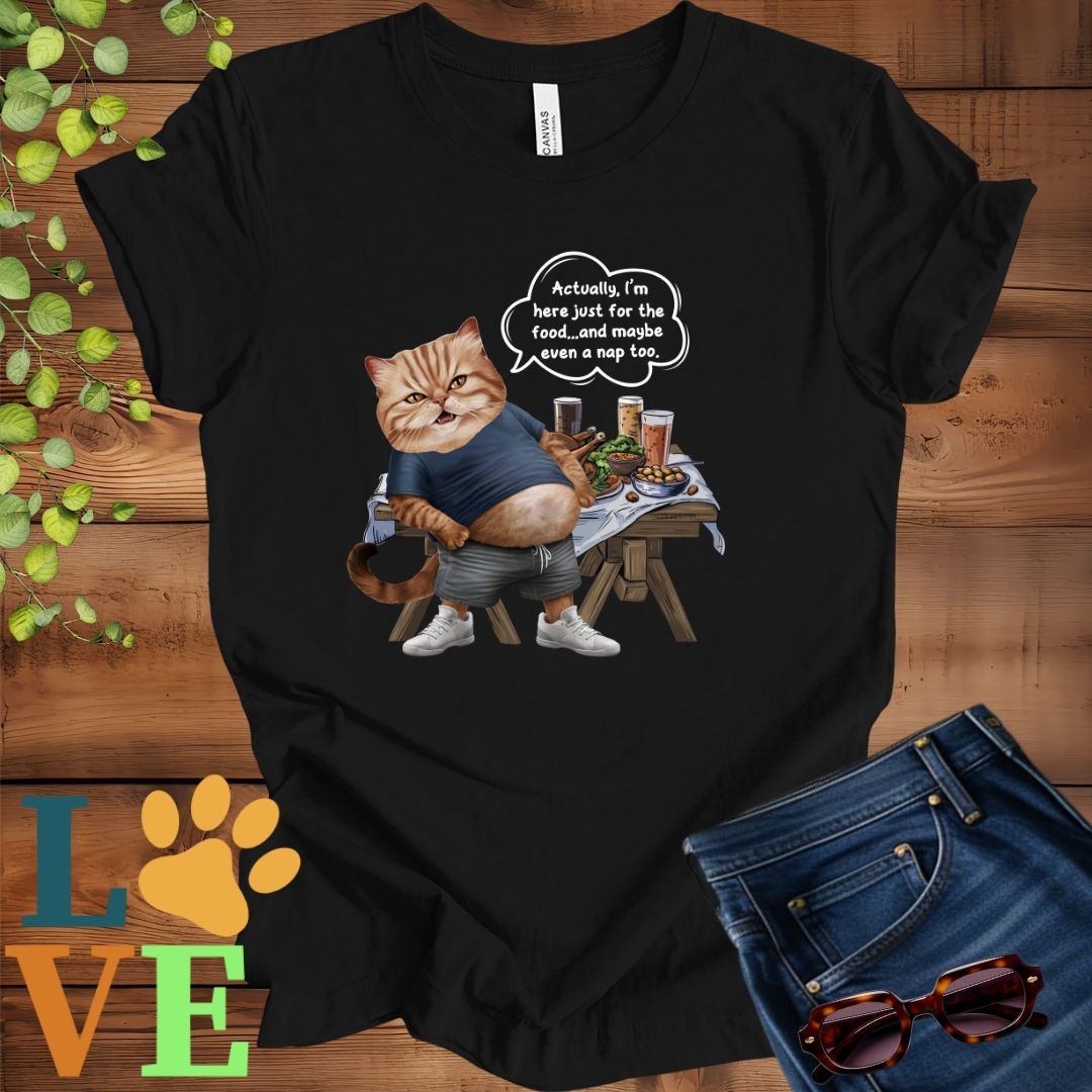 Black t-shirt with an anthropomorphic Exotic Shorthair cat, standing in front of a table with food and drinks, showing its pot belly and humorous speech bubble message.