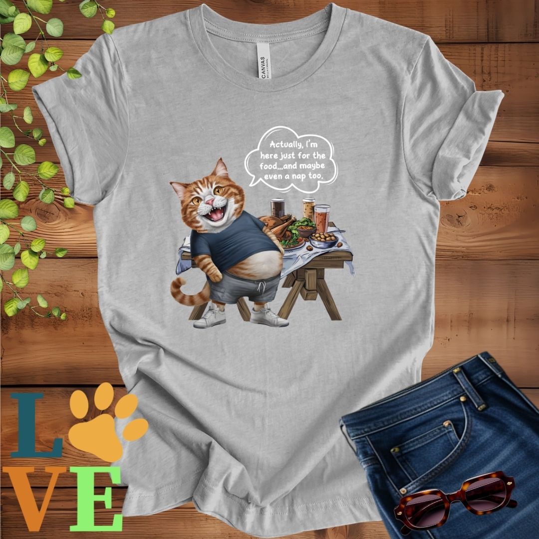 Light grey heather (athletic heather) t-shirt with an anthropomorphic ginger cat, standing in front of a table with food and drinks, showing its pot belly and humorous speech bubble message.
