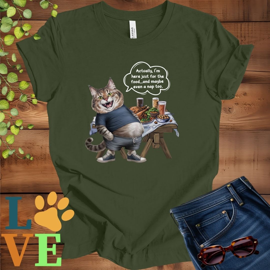 Olive green (military green) t-shirt with an anthropomorphic Maine Coon cat, standing in front of a table with food and drinks, showing its pot belly and humorous speech bubble message.