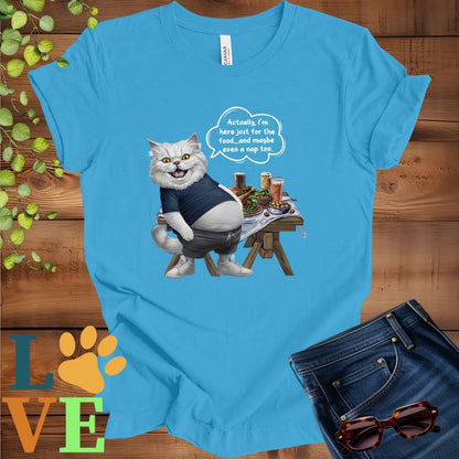 Bright Aqua Blue t-shirt with an anthropomorphic Persian cat, standing in front of a table with food and drinks, showing its pot belly and humorous speech bubble message.