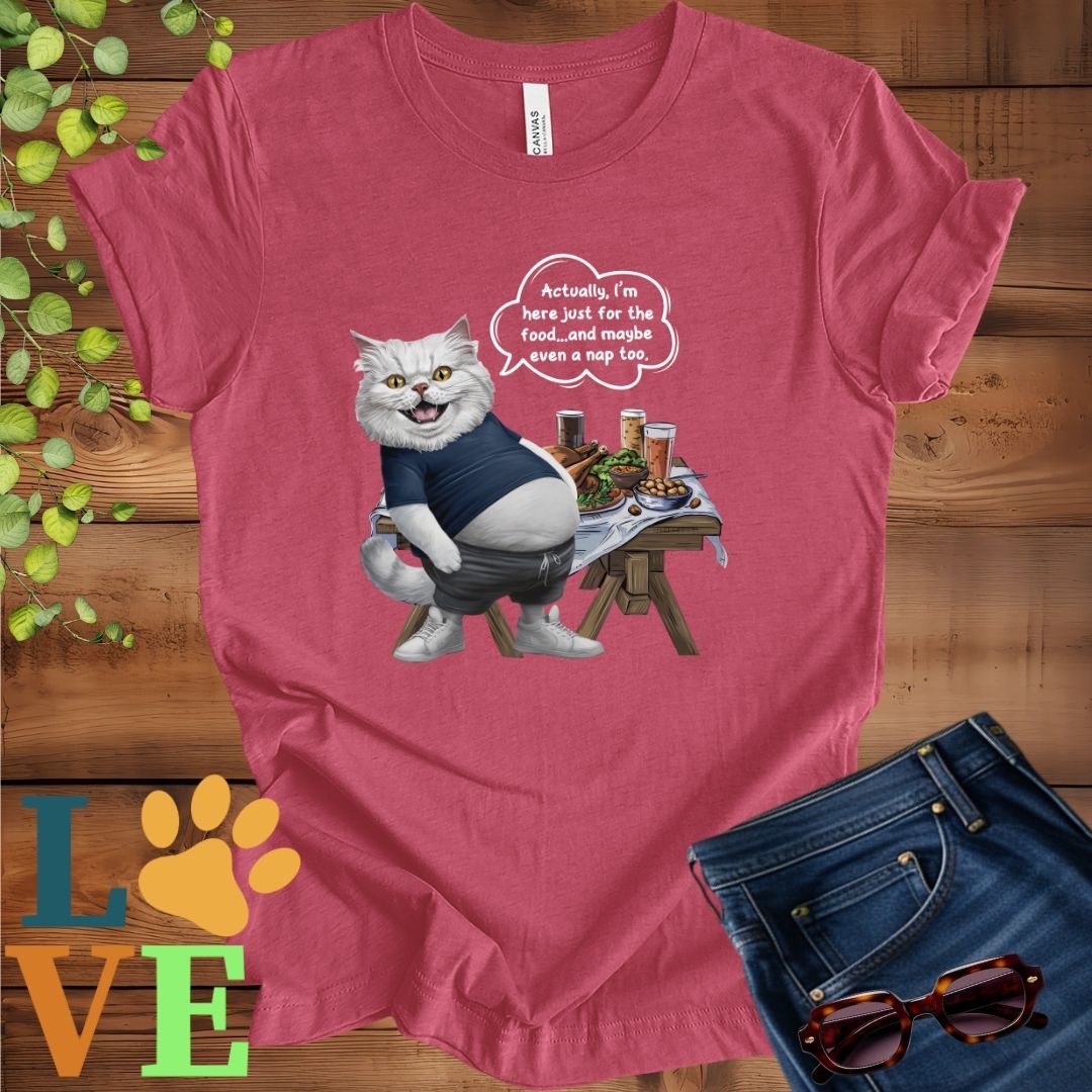 Muted raspberry pink (heather raspberry) t-shirt with an anthropomorphic Persian cat, standing in front of a table with food and drinks, showing its pot belly and humorous speech bubble message.