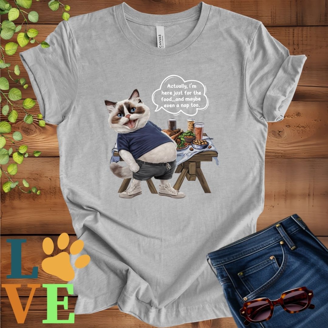 Light grey heather (athletic heather) t-shirt with an anthropomorphic Ragdoll cat, standing in front of a table with food and drinks, showing its pot belly and humorous speech bubble message.