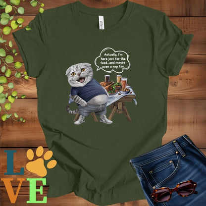 Olive green (military green) t-shirt with an anthropomorphic Scottish Fold cat, standing in front of a table with food and drinks, showing its pot belly and humorous speech bubble message.