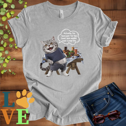 Light grey heather (athletic heather) t-shirt with an anthropomorphic tabby cat, standing in front of a table with food and drinks, showing its pot belly and humorous speech bubble message.