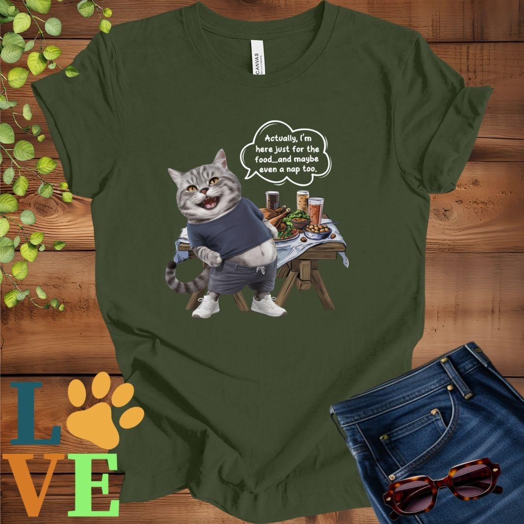 Olive green (military green) t-shirt with an anthropomorphic tabby cat, standing in front of a table with food and drinks, showing its pot belly and humorous speech bubble message.
