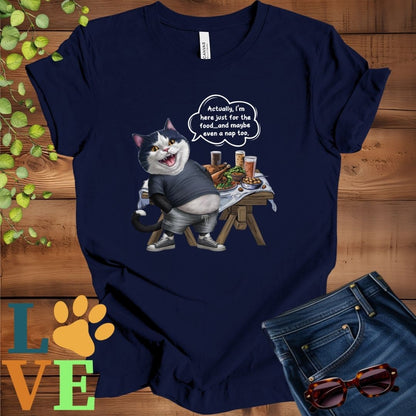Navy blue t-shirt with an anthropomorphic tuxedo cat, standing in front of a table with food and drinks, showing its pot belly and humorous speech bubble message.