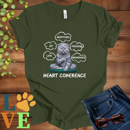 Olive green (military green) t-shirt with a meditating Scottish Fold cat, surrounded by floating emotion bubbles labelled love, joy, gratitude, freedom, abundance, and 'Heart Coherence' slogan.
