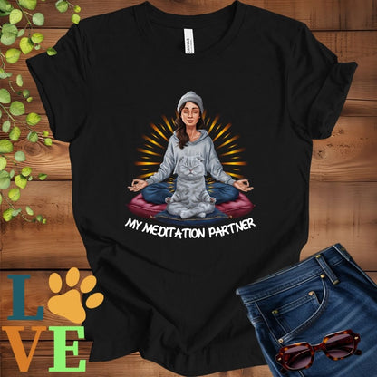 Black t-shirt featuring a woman meditating with her Scottish Fold cat and the slogan "My meditation partner".