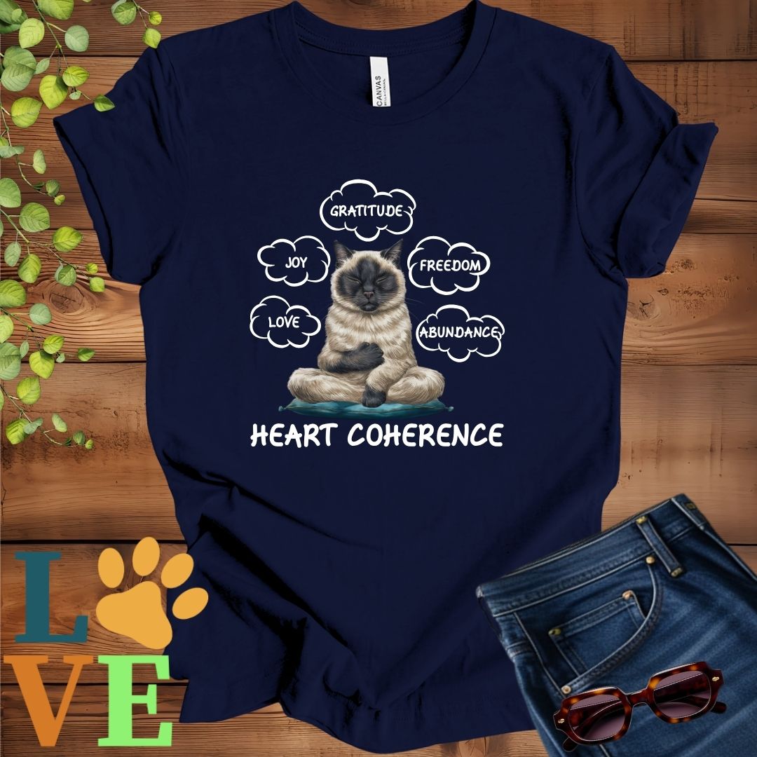 Navy Blue t-shirt with a meditating Siamese cat, surrounded by floating emotion bubbles labelled love, joy, gratitude, freedom, abundance, and 'Heart Coherence' slogan.
