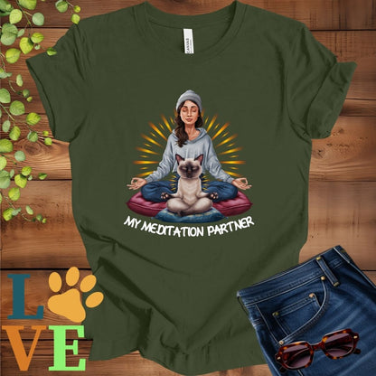 Olive green (military green) t-shirt featuring a woman meditating with her Siamese cat and the slogan "My meditation partner".