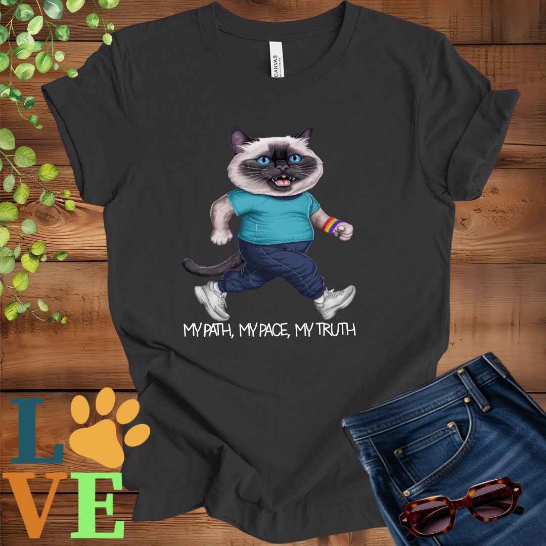Dark grey heather t-shirt featuring an anthropomorphic Siamese cat in exercise wear walking confidently with the slogan, "My path, my pace, my truth."
